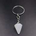 Detailed view of natural white crystal hexagonal cone pendant on silver keychain - White Crystal