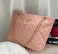 Pink quilted tote bag with pearl crown pendant and golden chain handles for women - Pink