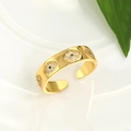 Detailed view of bohemian gold evil eye ring with micro-pave blue and white zircon - Adjustable Open / Gold
