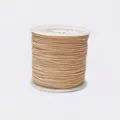Detailed close-up of 0.8mm beige braided cord on a white spool for jewelry making - Color 111 Off-White