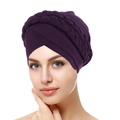 Detail of a purple turban hat featuring a braided design and soft milk silk fabric - Dark Purple