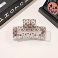 Detail of Halloween hair claw clip with black skulls and red hearts on acrylic base - 8.5cm Transparent Square - Heart Skull