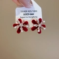 Macro shot of S925 silver snowflake earrings with red flocking, zircon, and pearls - 9# Silver Earring Post - Gold - Red Sphere
