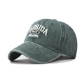 Detailed close-up of white 3D Florida embroidery on a washed dark green baseball cap - Adjustable / Dark Green