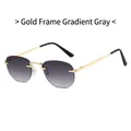 Lunettes de soleil ovales dorées avec verres gris dégradés pour un style urbain moderne - Monture Dorée Gris Dégradé