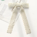 Detail of white bow hair clip with silver tube bead embroidery and elegant long tassels - White Rhombus Beaded Bow Clip
