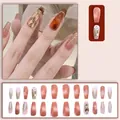 Faux ongles champagne scintillants avec dégradé ambre pêche, effet œil de chat et strass - Style Œil de Chat Dégradé Rose Pêche et Ambre (D531) / 24 Pièces/Ensemble