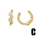 Minimalistische gouden kralen oormanchet in C-vorm met vier witte zirkonia stenen bezet - Stijl C-Beaded Ronde Stenen