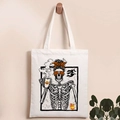 Close-up of Halloween skull and pumpkin print on high-quality off-white canvas tote bag - Skeleton Head Coffee Style