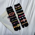 Japanese style black tabi socks with colorful traditional jacquard patterns on book - 35-41 / Colorful Knots