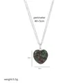 Macro detail of heart-shaped natural stone pendant with green and red textures - A2-09-Necklace (Red-Green Spotted)