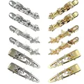 Set of 12 butterfly and star hair clips in gold and silver finish with rhinestones - Set of 12