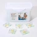 Five-in-one laundry detergent pods in storage box with green, white, and yellow chambers - 5-in-1 Camellia 50 Capsules Boxed