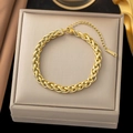 Golden braided stainless steel bracelet with lobster clasp and adjustable link chain - Flower Basket Chain Bracelet / Gold