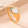 Gold plated stainless steel wide band ring featuring a clear heart-shaped gemstone - White