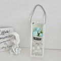 Three light blue soap roses in a transparent floral gift box with silver handle - Rose Light Blue With Gift Box