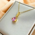 Close-up of a pear-cut pink zircon pendant on a gold titanium steel necklace for women - FZ003-Pear Waterdrop Pink Zircon