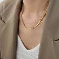 Golden snake chain necklace with sparkling zircon butterfly pendant on a female model - Gold Necklace (40+5cm)
