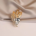 Elegant gold wheat leaf brooch with large pear-cut crystal on champagne satin fabric - 559#
