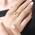 Gold plated open ring featuring a rectangular and teardrop zircon on a model's hand - Size 7/Adjustable / Gold White Crystal Zircon