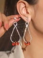 Long red rhinestone fringe earrings with silver base and sparkling water drop accents - Silver Long Drop Earrings with Red Marquise Stones