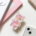 Detailed macro view of a 3D laser-effect bear phone grip with sparkling glitter filling - White (Laser Glitter)