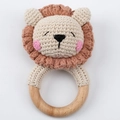 Handmade crochet lion baby rattle with brown mane and natural wooden ring handle - Red Hair Lion