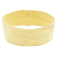 Detail of yellow elastic yoga headband showing breathable cotton fabric and wide band design - Off-white