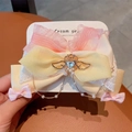Detail of pink lace bow hair clip with winged heart rhinestone and pearl fringe - Wings of Love (A2944)
