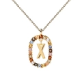 Gold letter X necklace with colorful zircon stones in an oval frame pendant - Letter X
