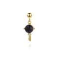 Macro view of gold S925 silver key pendant with dark blue stone and sparkling zircon detail - Black Stone Key