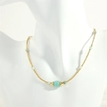 Detail of beaded necklace with gold-toned accents and turquoise stone beads on a mannequin - Amazonite (NE1991)