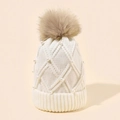 Winter beige cable knit beanie featuring large faux fur pompom and pearl decorations - White