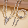 Conjunto de joyas de tres piezas con perlas y diamantes de imitación, collar y pulsera - Plateado