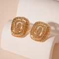 Macro view of gold-tone geometric earrings with unique hammered texture and hollow design - Gold Pleated Spiral Square Stud Earrings (Silver Pin)