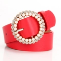 Women's bright red fashion belt with a pearl and rhinestone encrusted round buckle - Red