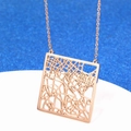 Rose gold square pendant necklace featuring an intricate hollow city map design on blue background - London UK / Rose Gold