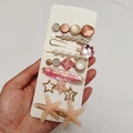 8-piece hair clip set in candy pink and gold with faux pearls and resin starfish - Huiwei Style (8 Piece Set)