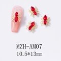 Detailed close-up of 10.5x13mm gold spider nail charms with red rhinestones - Gold Base Red Rhinestone (AM07)