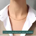 Close-up of 1.7mm wide 18K gold plated cross chain necklace worn on model neck - Thick Beaded Cross Chain (P873) / 40+5cm Length 1.7mm Width / Gold