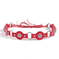 Detail of red leather belt with turquoise inlay and silver rivet accents in a knotted style - Antique Silver Rose Red