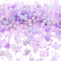 DIY jewelry beads set in purple tones including frosted glass rounds and starfish shapes - Lilac Purple