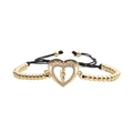 Adjustable golden heart bead bracelet with white zircon and black woven cord on white background - Heart Charm + Copper Bead Black Rope