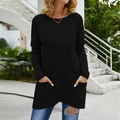 Outdoor shot of a casual black long-sleeve T-shirt with dual side pockets and tunic length - S / Tops / Black
