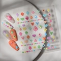 Close-up of 3D embossed poker heart and spade nail stickers with colorful rhinestones - Poker Elements Style (CO-187)