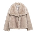 Detail of faux fur coat featuring wide lapel and soft plush texture in light brown - XS / Tan