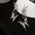 Pendientes de mariposa en metal líquido plateado con diseño irregular y acabado pulido - Pendiente de Botón de Mariposa de Diamantes de Imitación Plateado