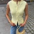 Pale yellow knitted sleeveless vest cardigan with single-breasted buttons in street style - S / Yellow