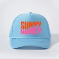 Detail of light blue trucker hat featuring Sunny Honey text and vintage mesh texture - All Sky Blue