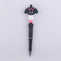 Detail of DIY beadable pen featuring a black cartoon bat topper and silicone beads - Black Bat